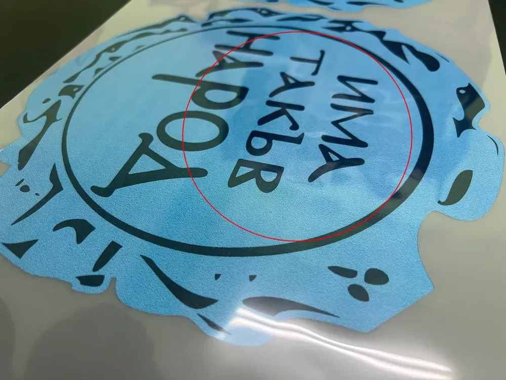 Inconsistent colors due to insufficient white ink coverage.